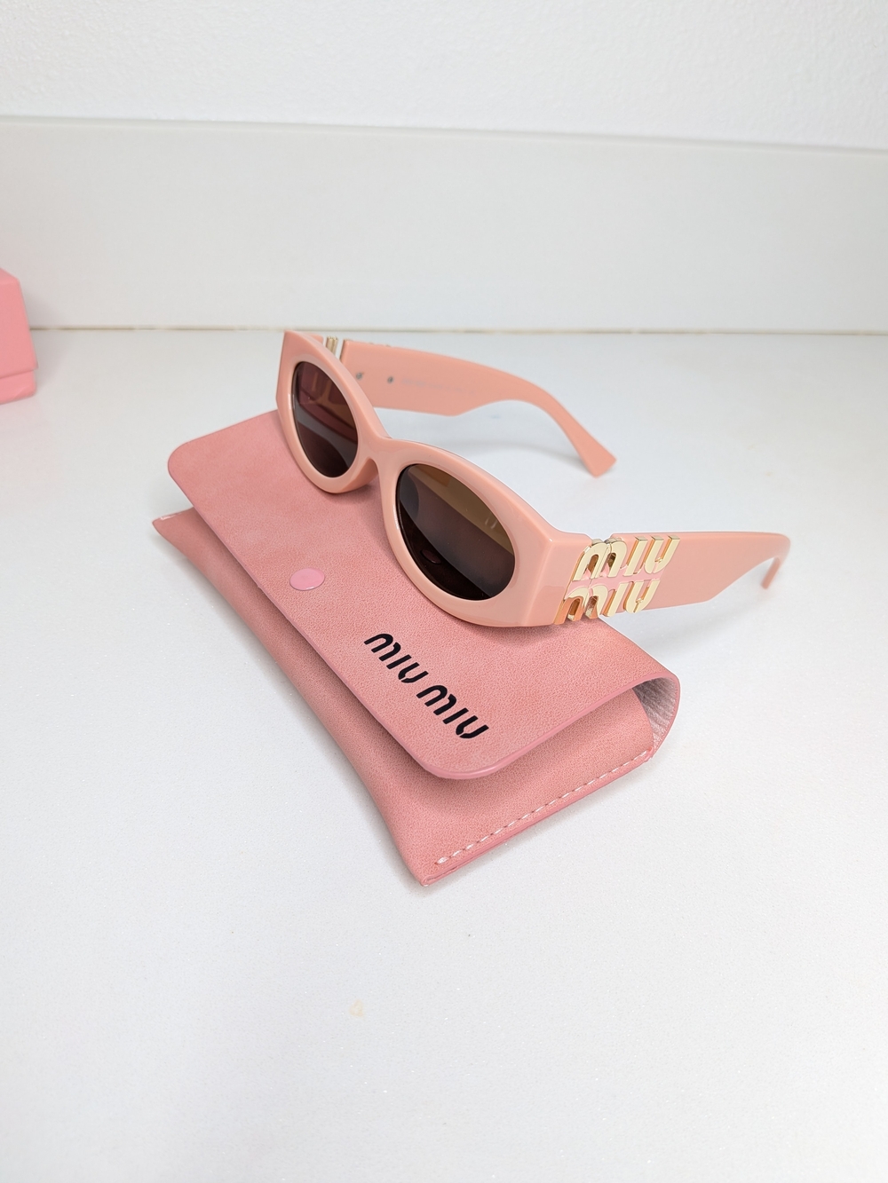 Miu Miu Pink Oval Sunglasses